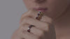 Man models multiple Castle bands with various gemstones